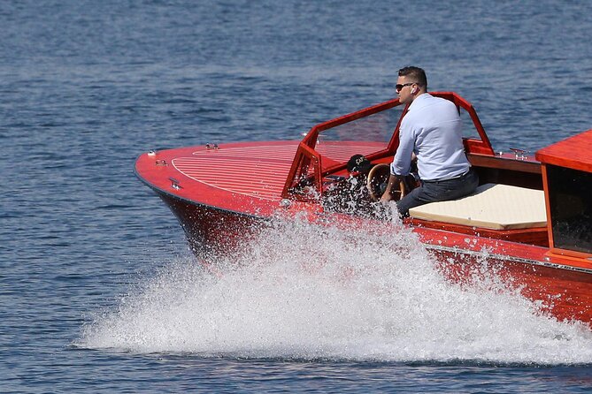 2 Hours Private Wooden Boat Tour on Lake Como 6 pax - Como’s waterfront landmarks: Life Elettric and the seaplane hangar