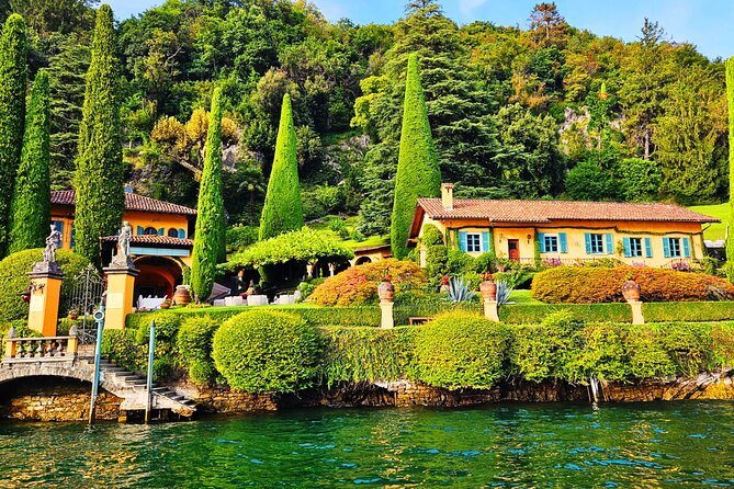 Boatparty Shared Tour on Lake Como–2 Hours of Villas, Wine & Swim - Orrido di Nesso from the water: waterfall drama and bridge-arch framing