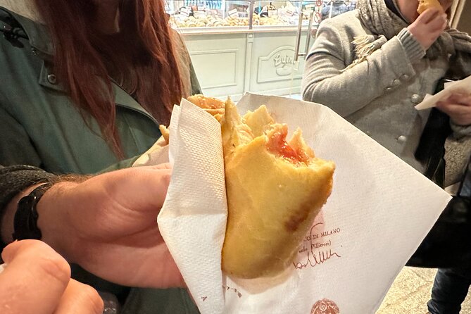Delicious Milan Street Food Tour Tasting and Sightseeing with Local Guide - Sant’Ambrogio: Milan’s Patron Saint in Stone