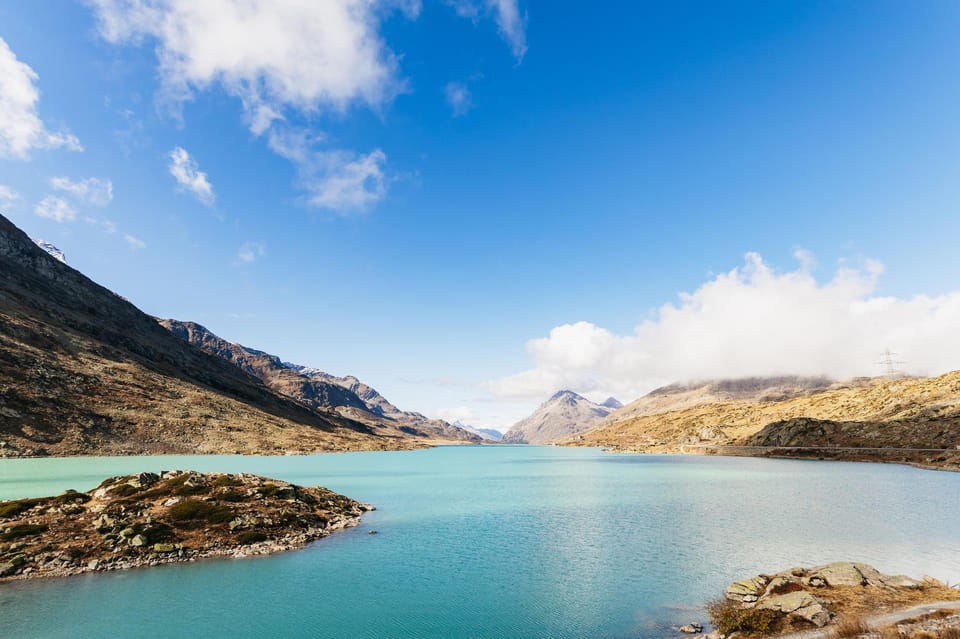 From Milan: St. Moritz and Panoramic Bernina Express Tour - Val Poschiavo and the Swiss–Italian border shift in your afternoon
