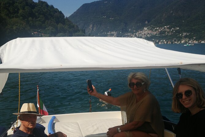 half day private boat tour on Lake Como - Moltrasio and Villa Fontanelle: Versace-era design story