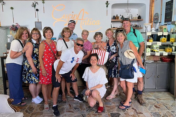 Lake Como Food Tour - Eat like a real Local - Palazzo Rusca wine shop: cured meats, real pairing, and shop-watching