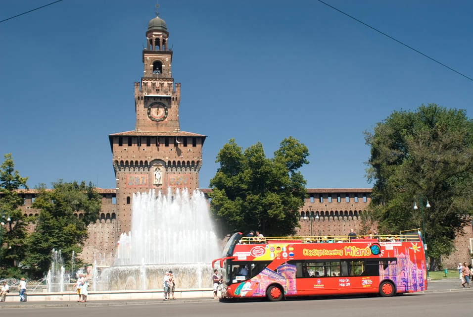 Milan: Night Tour by Bus - Navigli canals after dark: the best neighborhood vibe per minute