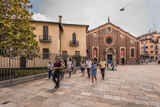 Milan Skip the Line The Last Supper and Renaissance Walking Tour - Castello Sforzesco: the Sforza court, the Clock Tower, and Leonardo’s Milan home base