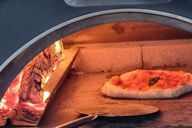 Neapolitan DOC Pizza Class And Cooking in a Wood Oven at a Local's house - Fresh smoked buffalo mozzarella: a big deal for flavor
