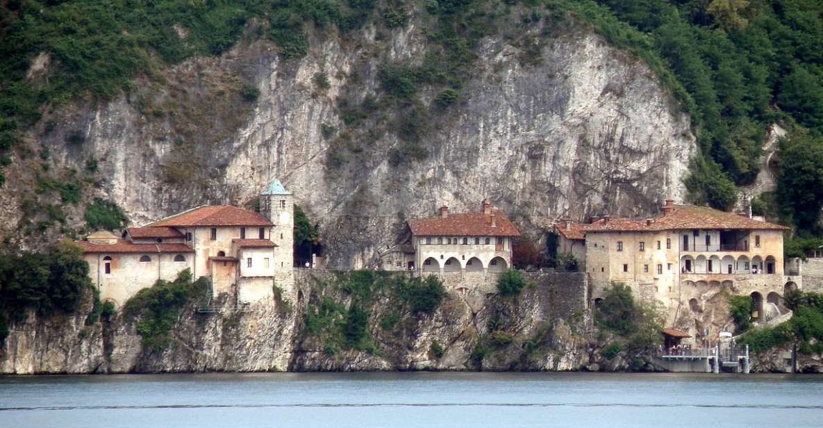 Stresa: Private Cruise to Santa Caterina del Sasso - The first stretch on the Stresa coast: villa views you can take in quickly