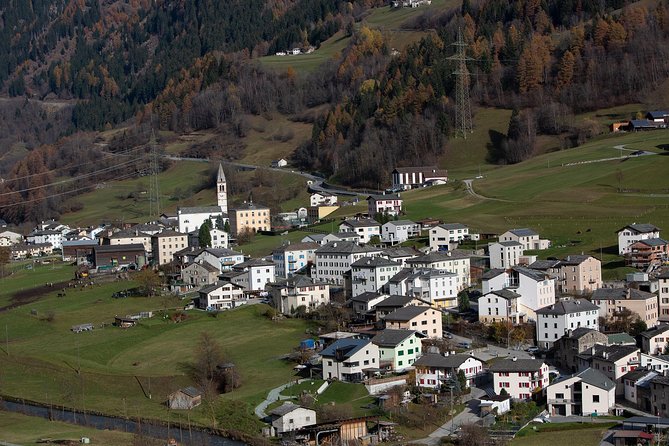 Swiss Alps Bernina Red Train and St.Moritz Tour from Milan - Into the Engadin Valley and onward to Tirano
