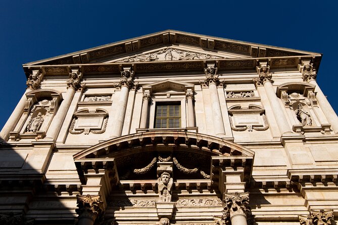 The Secret Milan – An Exclusive Stroll Beyond the Beaten Path - Piazza San Fedele: where Milan’s calm comes with a dramatic story