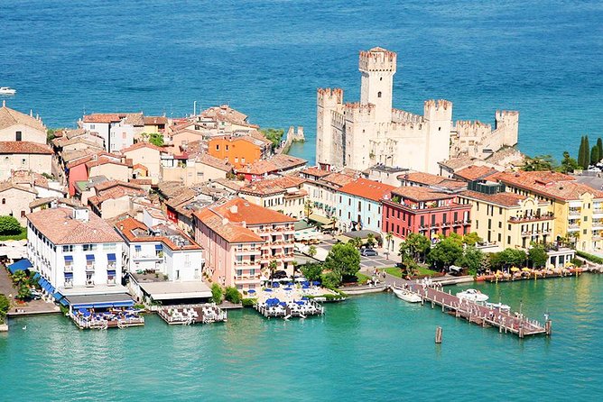 Verona & Lake Garda with Boat Cruise: Full-Day Tour from Milan - Sirmione on Lake Garda: castle exteriors, old-town strolls, and shopping time