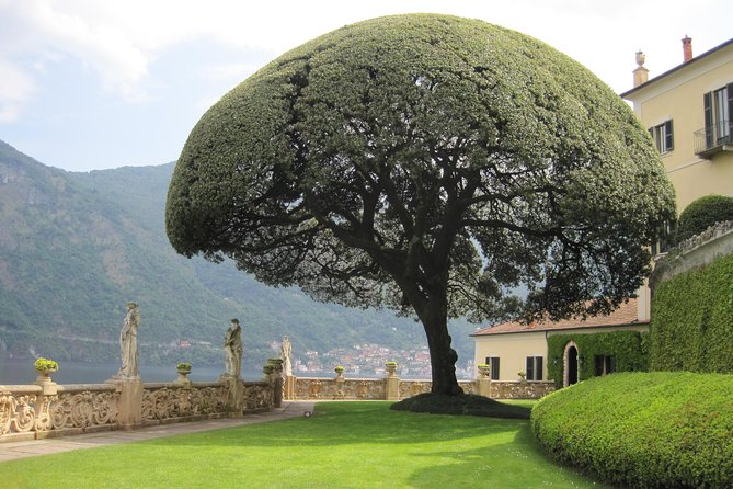 Villa Balbianello and Flavors of Lake Como Walking and Boating Full-Day Tour - The open-top Venetian water taxi: villa views from the water